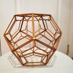 Brass symmetrical home decor object